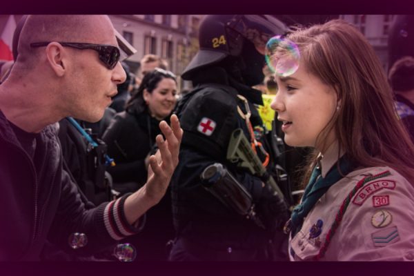 Girl Scout Smiling in Face of a Neo-Nazi Is a Total Hero